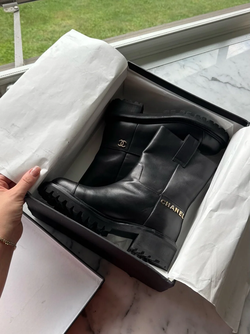 CHANEL Black Leather Lug-Sole Mid-Calf Combat boots